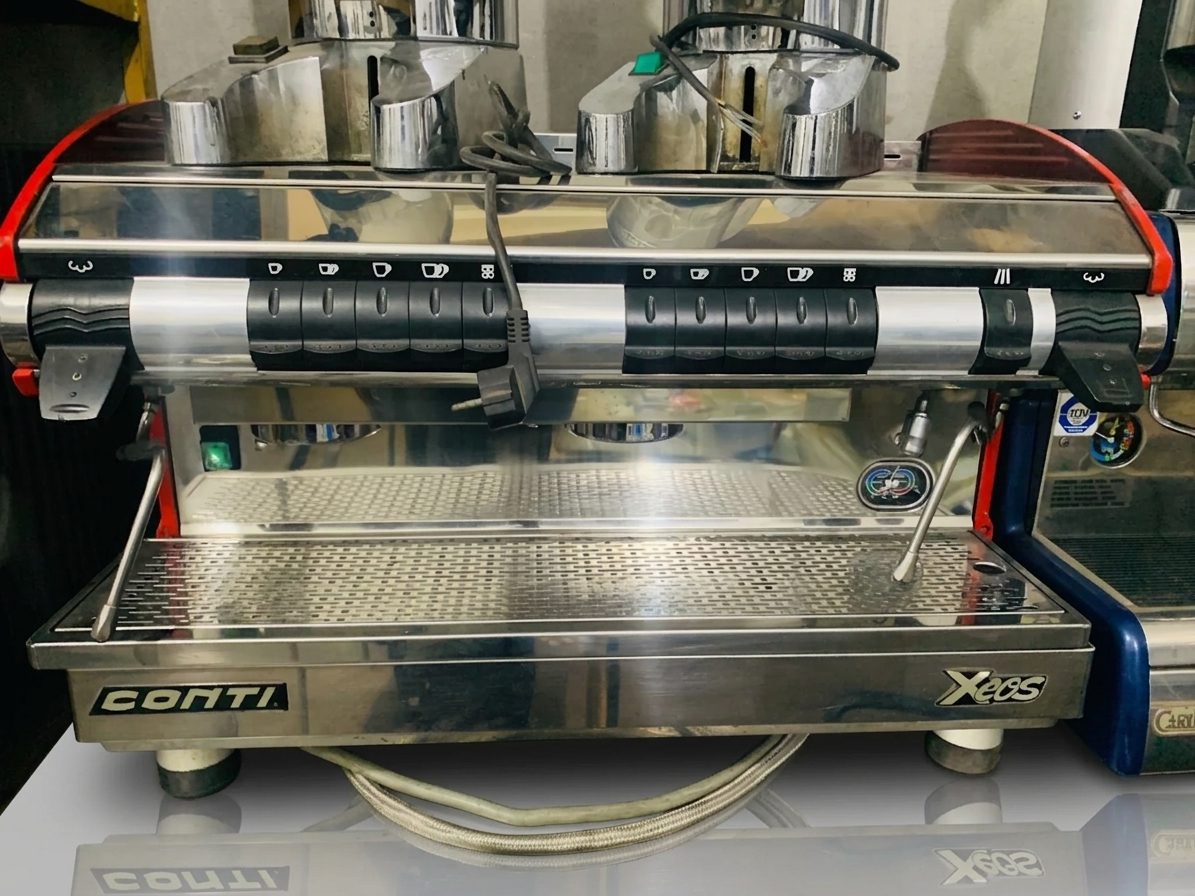 Two-group commercial espresso machine with grinders